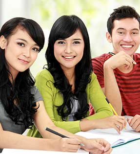 Three students pose together